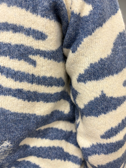 Jersey azul con estampado beige